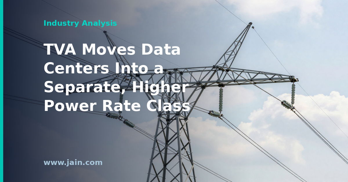 High-voltage transmission lines feeding a data center campus, illustrating TVA's separate data center power rate
