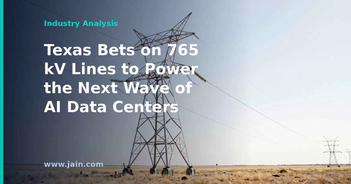 765 kV extra-high-voltage transmission towers stretching across Texas plains toward a data center campus