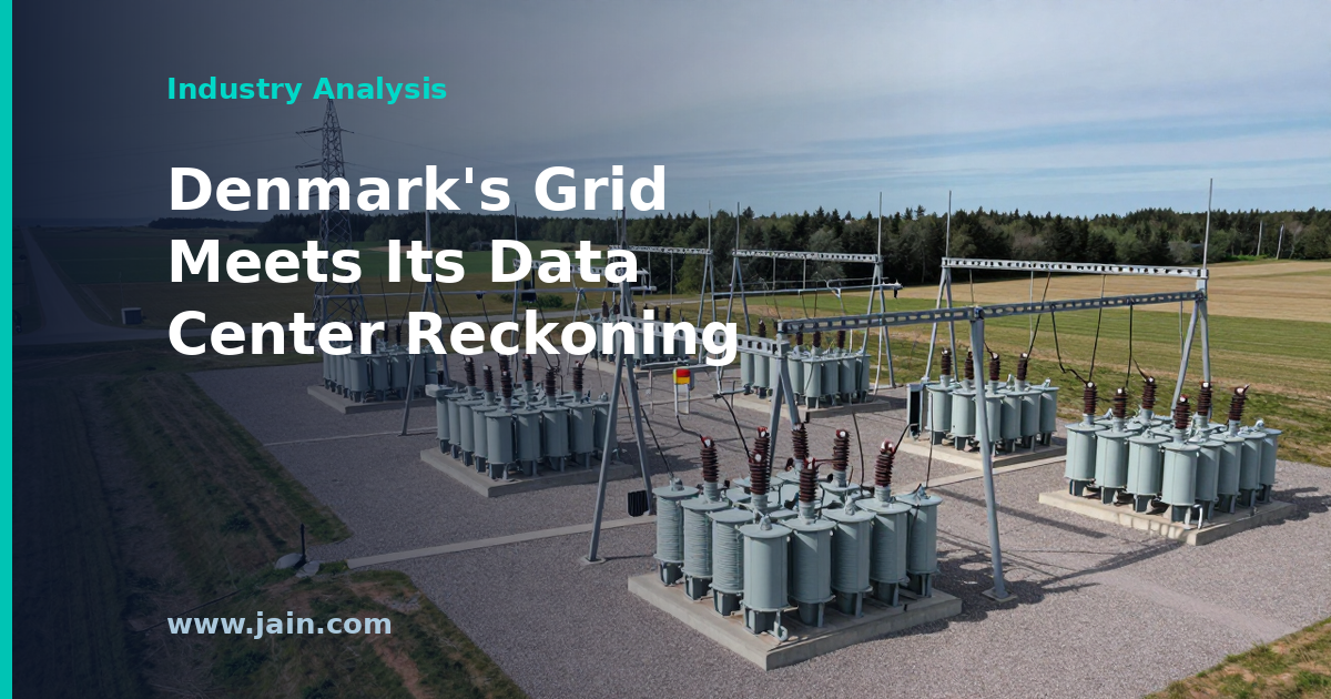 Denmark power grid strained by data center demand, wind turbines and transmission lines at dusk